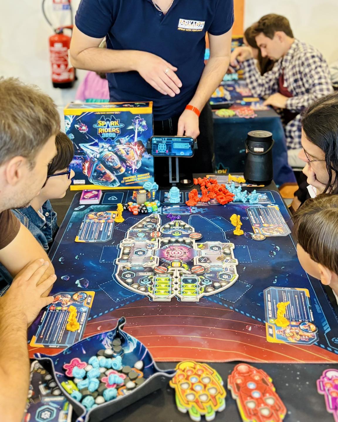 Fans playing Spark Riders 3000 at a live event