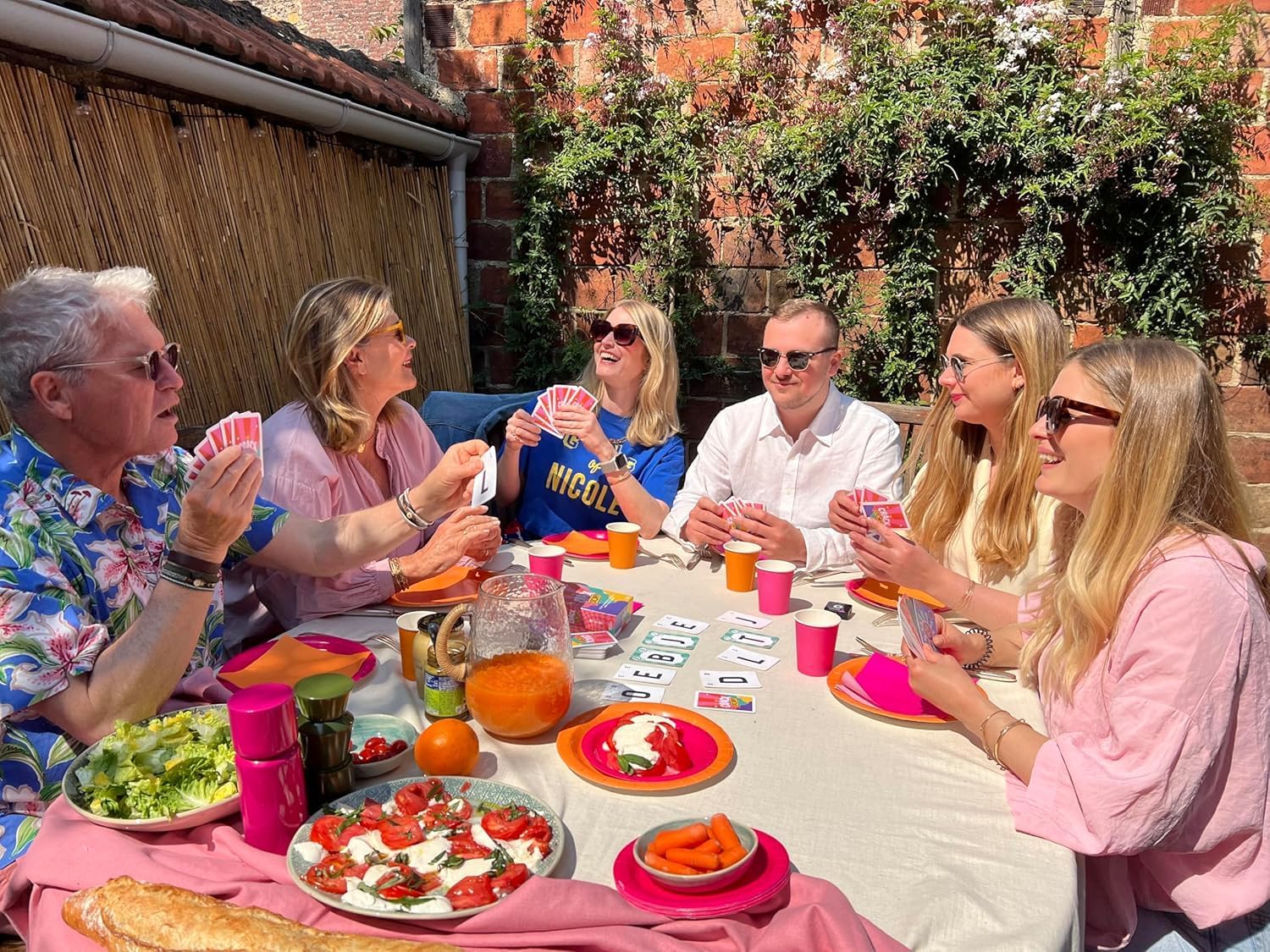 Family playing Crack Story together outdoors