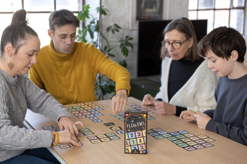Family enjoying Flowers card game
