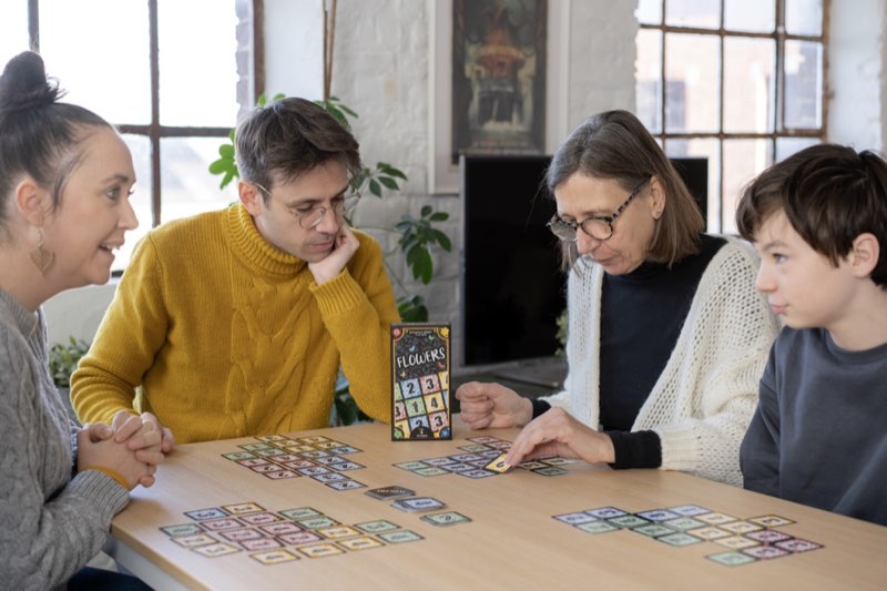 Family enjoying Flowers card game